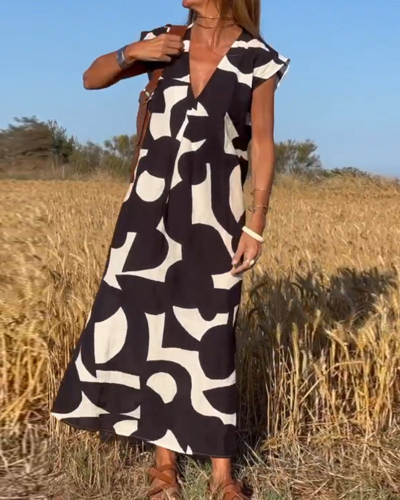 SITA - Robe à imprimé et décolleté en V