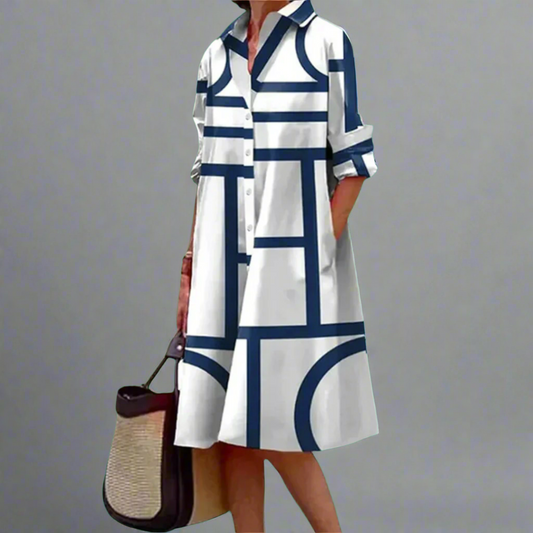 Cosima - Élégante robe midi bleue avec des rayures géométriques