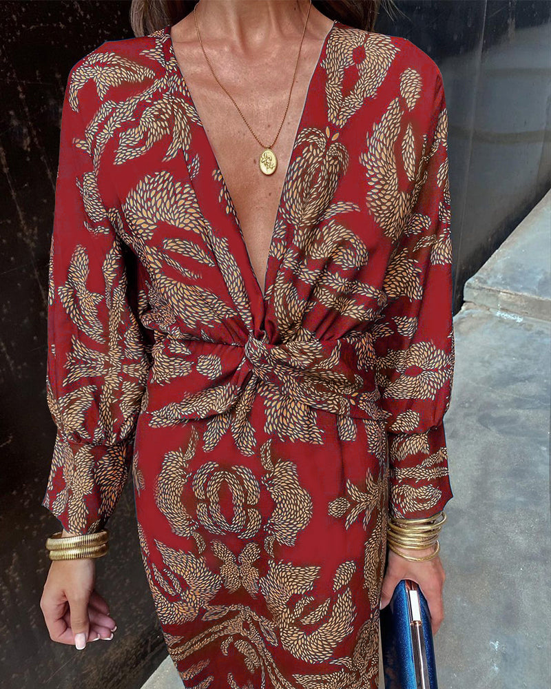 Grace – Robe midi élégante avec imprimé floral et nœud